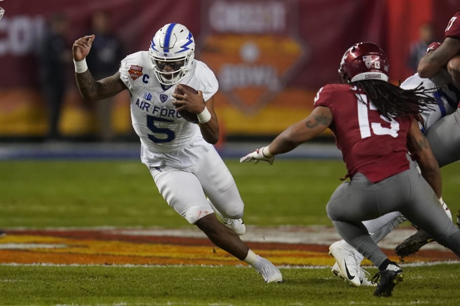 Air Force quarterback Donald Hammond III (5) runs for a first down against Washington State during the first half during the Cheez-It Bowl NCAA college football game, Friday, Dec. 27, 2019, in Phoenix.