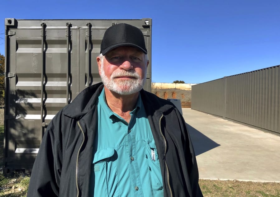 Jack Wilson, 71, poses for a photo at a firing range outside his home in Granbury, Texas, Monday, Dec. 30, 2019. Wilson trains the volunteer security team of the West Freeway Church of Christ, where a gunman shot two people Sunday before being shot by Wilson.
