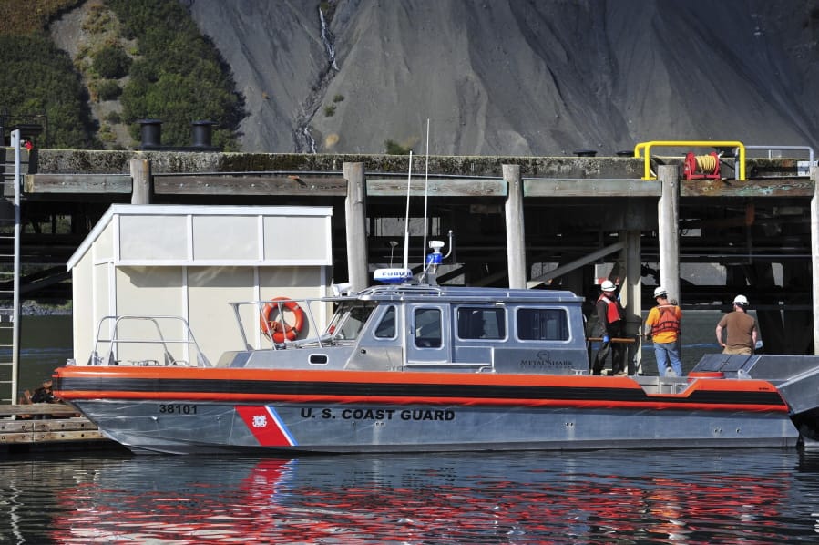 In this Sept. 23, 2011 photo, A Coast Guard 38-foot Special Purpose Craft Training Boat sits at the fuel pier in Women&#039;s Bay at Coast Guard Base Kodiak, Alaska. Nine people were hurt, including one critically, when a U.S. Coast Guard vessel collided with a U.S. Navy boat off Alaska&#039;s Kodiak Island. (Petty Officer 2nd Class Charly Hengen/U.S.