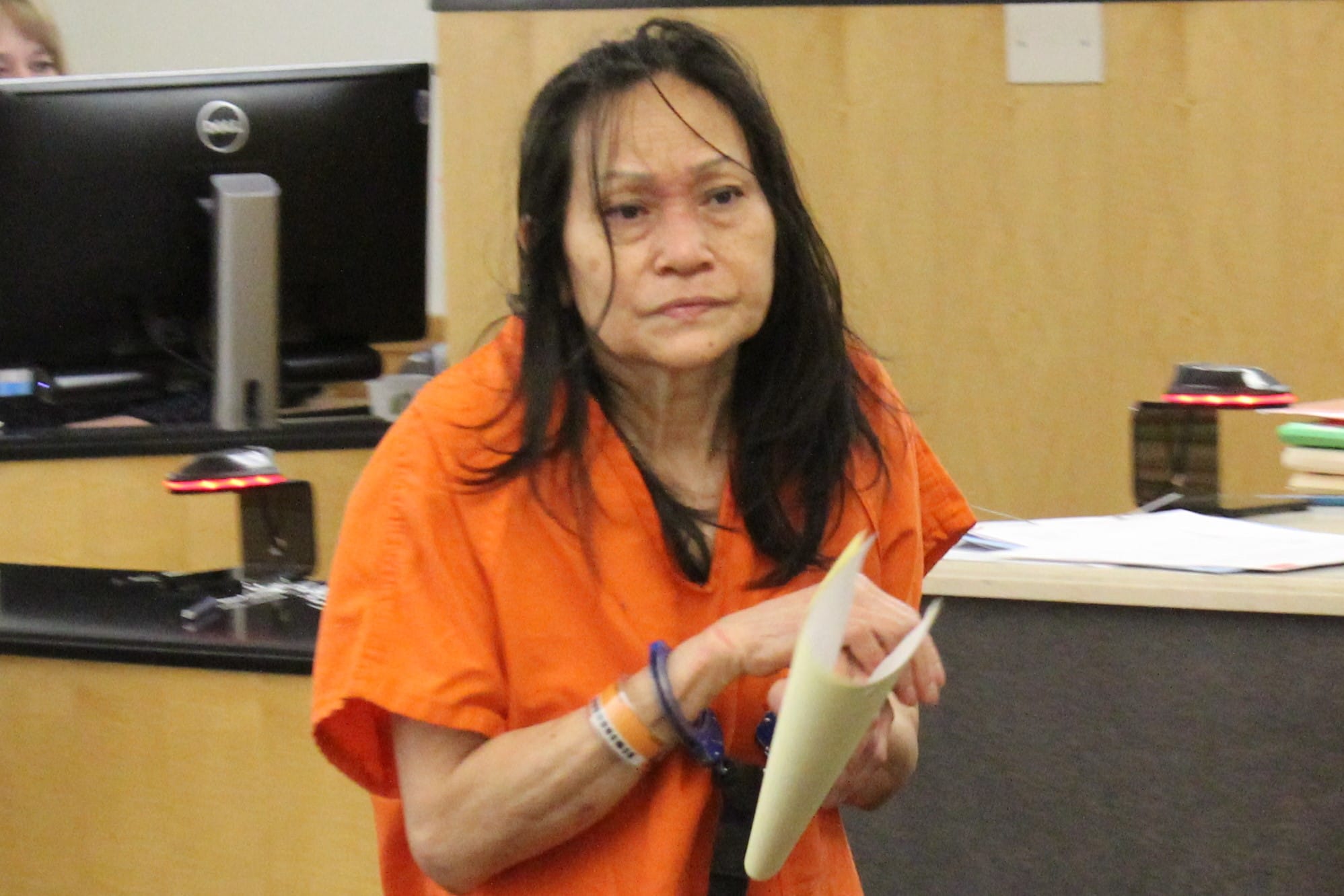 Momlamai Dara, 59, appears in Clark County Superior Court on Friday to face a charge of second-degree attempted murder for allegedly stabbing her husband, who wanted a divorce.
