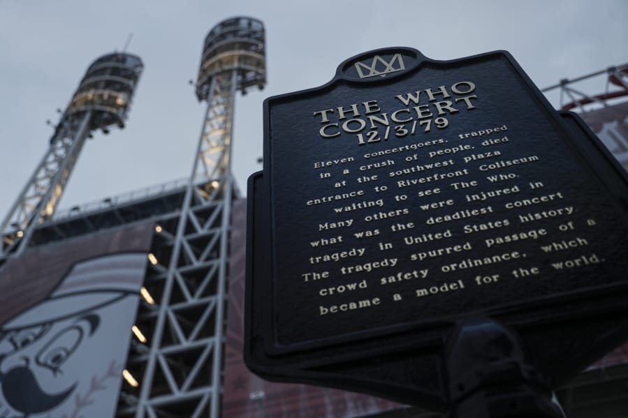 A memorial plaque for eleven concertgoers killed at a 1979 concert stands between Great American Ballpark and Heritage Bank Arena,  in Cincinnati. Tragedy four decades ago linked the British rock band The Who to a small suburban city in Ohio.