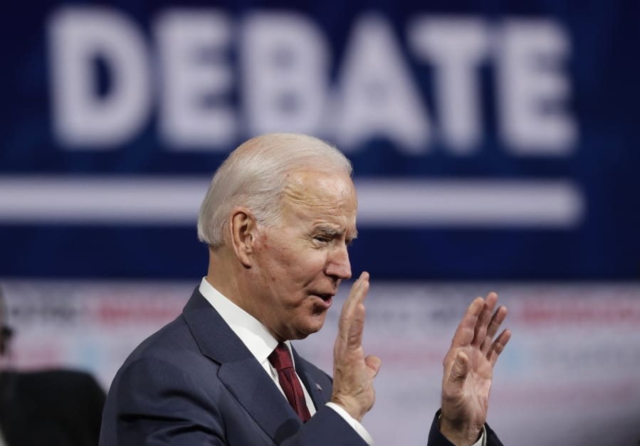 Democratic presidential candidate former Vice President Joe Biden waves to the crowd after a Democratic presidential primary debate Thursday, Dec. 19, 2019, in Los Angeles.