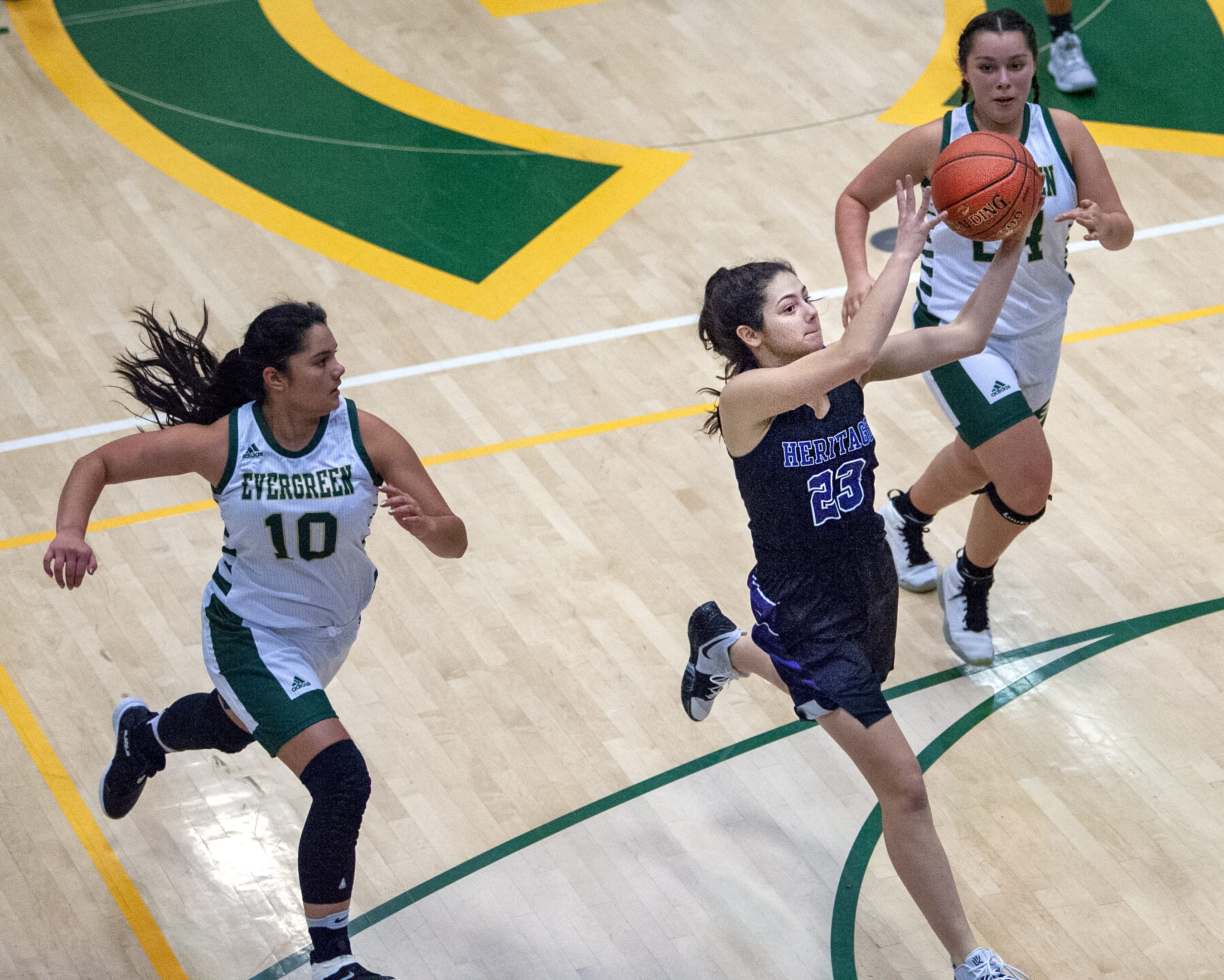 Images from Heritage’s 57-19 win over Evergreen in girls basketball nonleague play Tuesday at Evergreen High School.