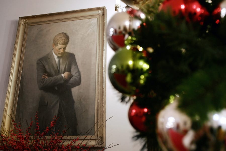 FILE - In this Nov. 30, 2006, file photo, a portrait of former President John F. Kennedy, framed by Christmas decorations, hangs in the White House in Washington. A copy of Kennedy&#039;s 1961 letter reassuring an 8-year-old Michigan girl, who had written him concerned that Santa would be killed if Russia tested a nuclear bomb at the North Pole, is being featured in December 2019 at the JFK Presidential Library and Museum in Boston.