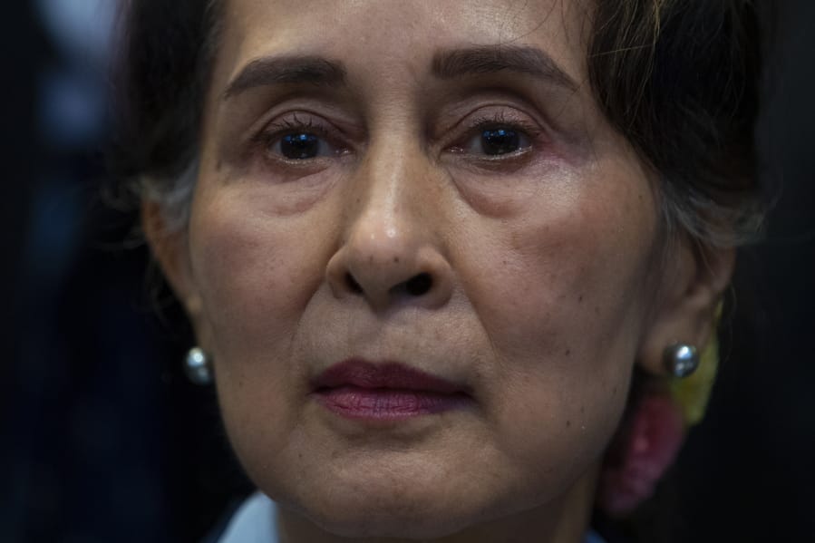 Myanmar&#039;s leader Aung San Suu Kyi waits to address judges of the International Court of Justice on the second day of three days of hearings in The Hague, Netherlands, Wednesday, Dec. 11, 2019. Aung San Suu Kyi will represent Myanmar in a case filed by Gambia at the ICJ, the United Nations&#039; highest court, accusing Myanmar of genocide in its campaign against the Rohingya Muslim minority.
