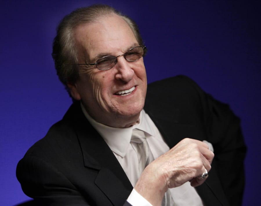 FILE - In this Friday, Oct. 7, 2011, file photo, actor Danny Aiello smiles while being photographed in New York. Aiello, the blue-collar character actor whose long career playing tough guys included roles in &quot;Fort Apache, the Bronx,&quot;  &quot;The Godfather, Part II,&quot; &quot;Once Upon a Time in America&quot; and his Oscar-nominated performance as a pizza man in Spike Lee&#039;s &quot;Do the Right Thing,&quot; has died. He was 86. Aiello died Thursday, Dec. 12, 2019 after a brief illness, said his publicist, Tracey Miller.