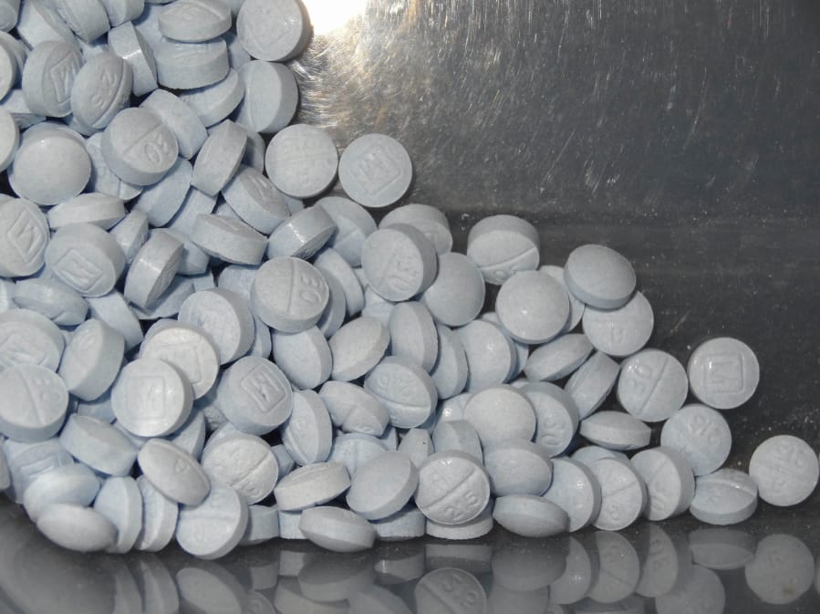 Fentanyl-laced fake oxycodone pills collected during an investigation are shown in this photo introduced as evidence at a trial. Accidental overdoses contribute to 90 percent of all U.S. opioid-related deaths. The unintentional death rate surged nine-fold between 2000 and 2017, a study found. (U.S.