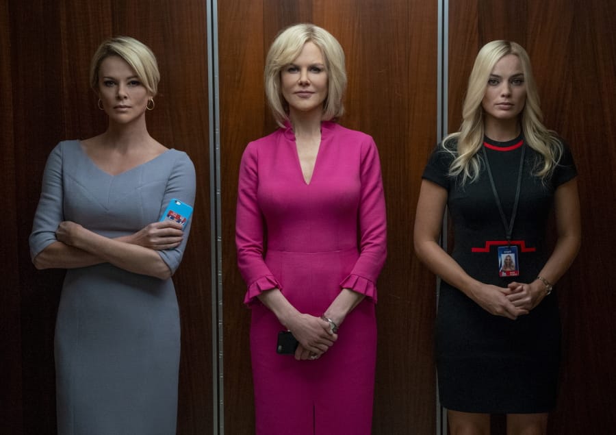 This image released by Lionsgate shows Charlize Theron, from left, Nicole Kidman and Margot Robbie in a scene from &quot;Bombshell.&quot; On Wednesday, Dec. 11, 2019, the cast of &quot;Bombshell&quot; was nominated for a SAG Award. Theron was also nominated for best actress and Kidman and Robbie were nominated for supporting actress. (Hilary B.