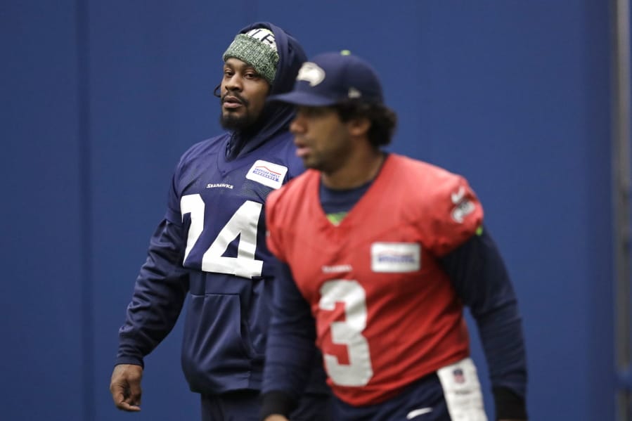 The return of running back Marshawn Lynch, left, has given the injury-riddled Seattle Seahawks a boost of energy.