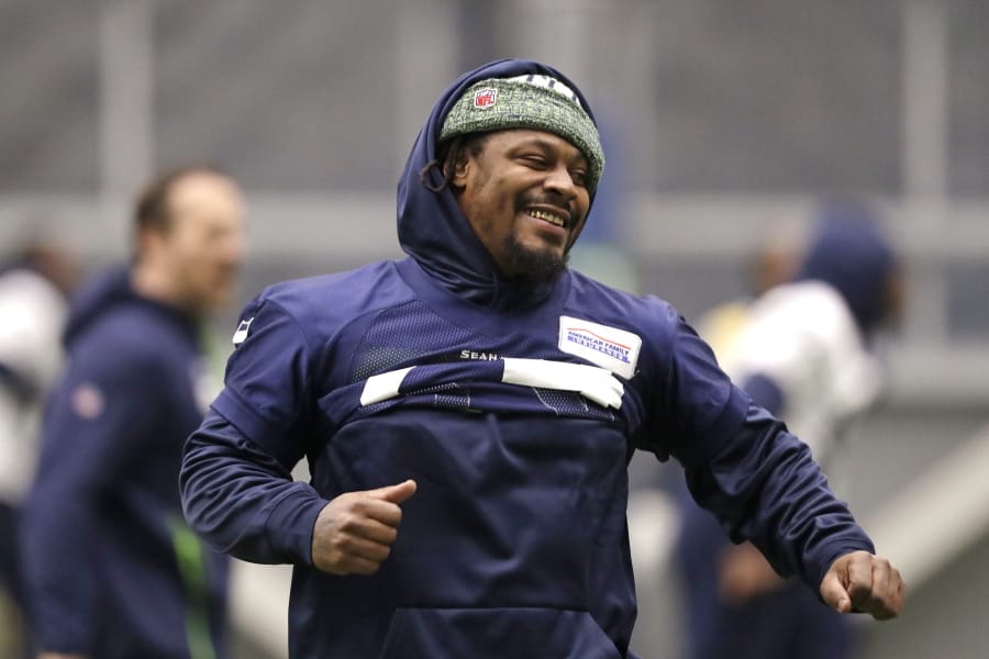 Seattle Seahawks running back Marshawn Lynch runs through warmups at the NFL football team&#039;s practice facility Tuesday, Dec. 24, 2019, in Renton, Wash. When Lynch played his last game for the Seahawks in 2016, the idea of him ever wearing a Seahawks uniform again seemed preposterous. Yet, here are the Seahawks getting ready to have Lynch potentially play a major role on Sunday against San Francisco with the NFC West title on the line.