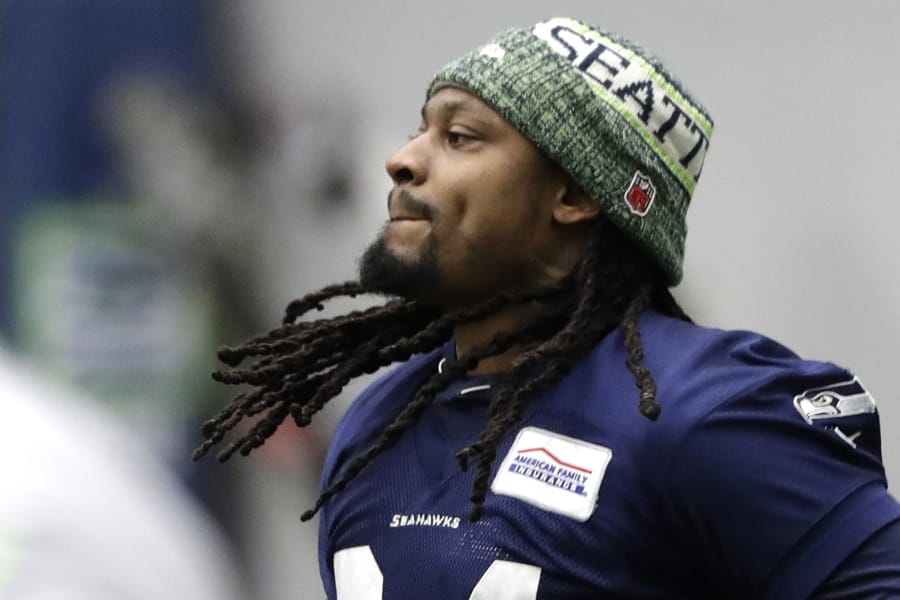 Seattle Seahawks running back Marshawn Lynch jogs as he warms up for NFL football practice, Friday, Dec. 27, 2019, in Renton, Wash. (AP Photo/Ted S. Warren) (Ted S.