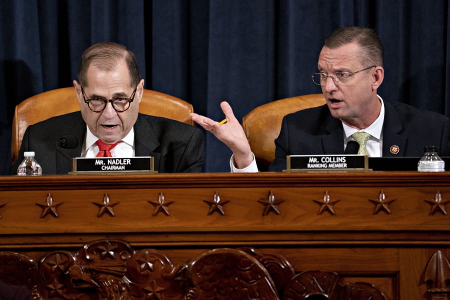 House Judiciary Committee Chairman Rep. Jerrold Nadler, D-N.Y., left, and ranking member Rep. Doug Collins, R-Ga., right,  both speaking during a House Judiciary Committee markup of the articles of impeachment against President Donald Trump, on Capitol Hill Thursday, Dec. 12, 2019, in Washington.