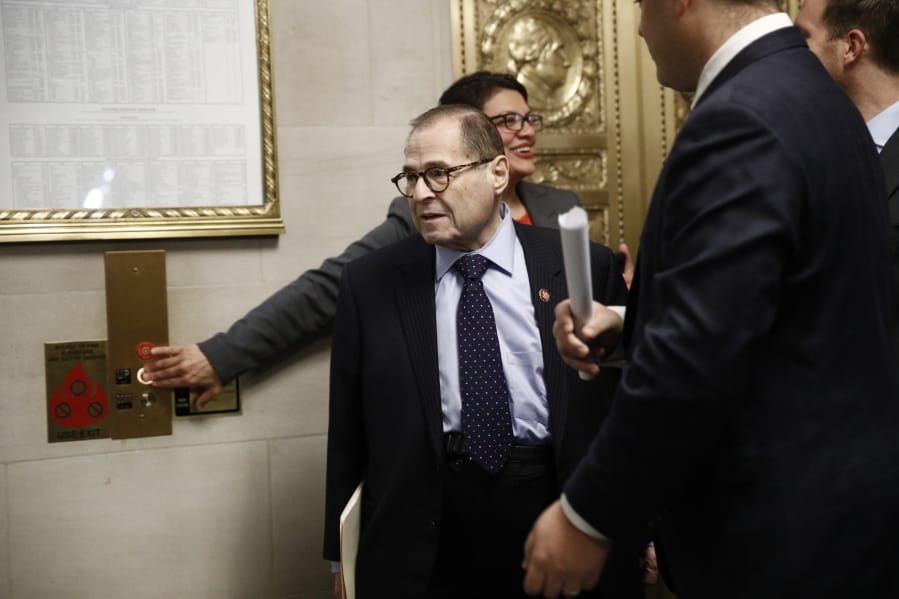 House Judiciary Committee Chairman Rep. Jerrold Nadler, D-N.Y., center, walks to a House Judiciary Committee markup of the articles of impeachment against President Donald Trump, Wednesday, Dec. 11, 2019, on Capitol Hill in Washington.