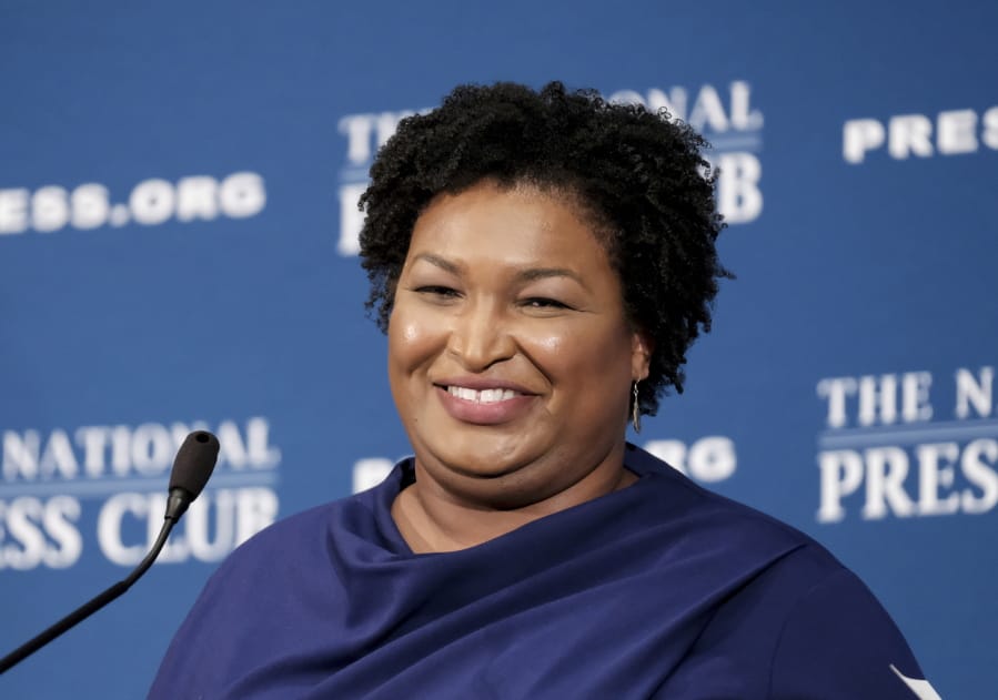 FILE - In this Nov. 15, 20-19 file photo, former Georgia House Democratic Leader Stacey Abrams, speaks at the National Press Club in Washington. A voting rights group founded by Democrat Stacey Abrams filed an emergency motion Monday, Dec. 16, 2019 asking a court to halt Georgia&#039;s planned mass purge of voters. The motion was filed by Fair Fight Action in U.S. District Court, just hours before the secretary of state&#039;s (AP Photo/Michael A.