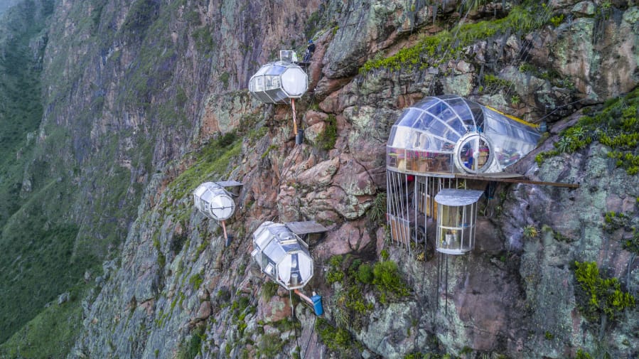 Skylodge Adventure Suites is made up of clear pods hanging above the Sacred Valley in Cusco, Peru.