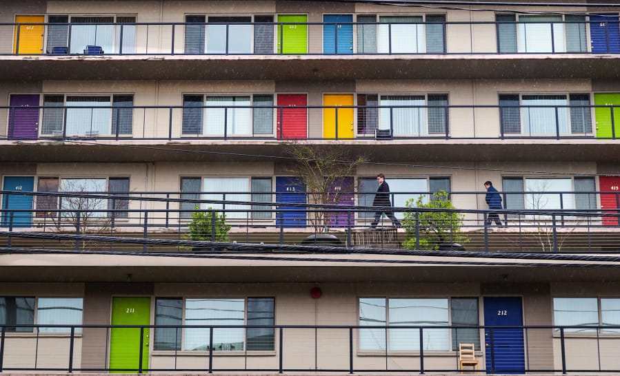 Colorful doors highlight the Coronado Apartments, in Seattle&#039;s Eastlake neighborhood.