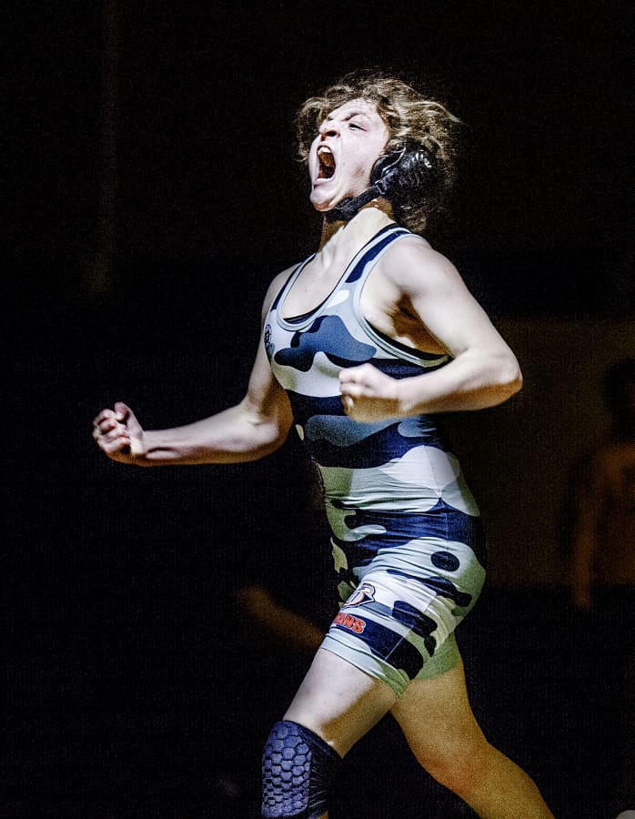 Union&#039;s Riley Aamold screams after earning a pin of Federal Way&#039;s London Johnson in the 130-pound championship.
