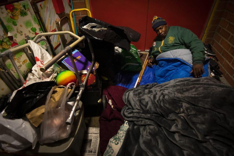 Theodore Henderson, 46, beds down for the night in the Chinatown neighborhood of Los Angeles, Calif., on Jan. 8. It is cold and Henderson is living unhoused. He has a facebook group for the homeless community. In Los Angeles, Theodore Henderson called the group &amp;quot;a respite to share our fears and not be castigated. When the former schoolteacher became ill, was evicted and ultimately ended up living in a park in Chinatown, he felt crushing shame. &quot;In the Facebook group, I encourage them and they encourage me,&quot; said Henderson, who hosts a podcast called &quot;We the Unhoused.&quot; He started using the term &#039;unhoused&#039; because &#039;homeless&#039; was often being spat at him like a slur, he said.