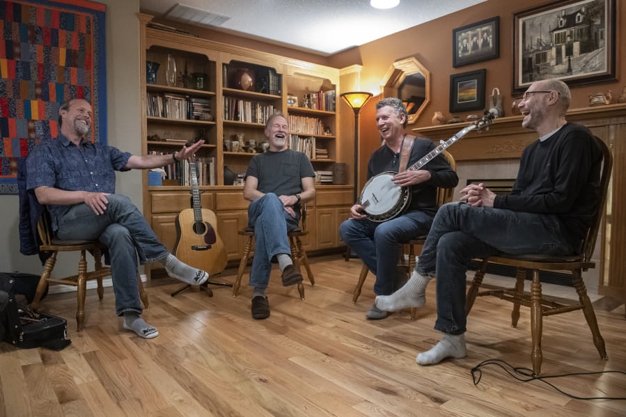 Fadin&#039; by 9&#039;s Seth Moran, from left, Dave Irwin, Joe Lapidus and Ben Shafton remember the joys and challenges of recording a new album at Irwin&#039;s home on a recent Thursday night.