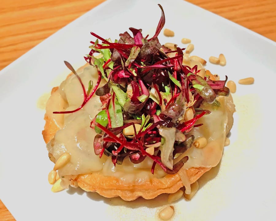 Onion tart at Roots Restaurant &amp; Bar in Camas is topped with Bulls Blood Beet microgreens.
