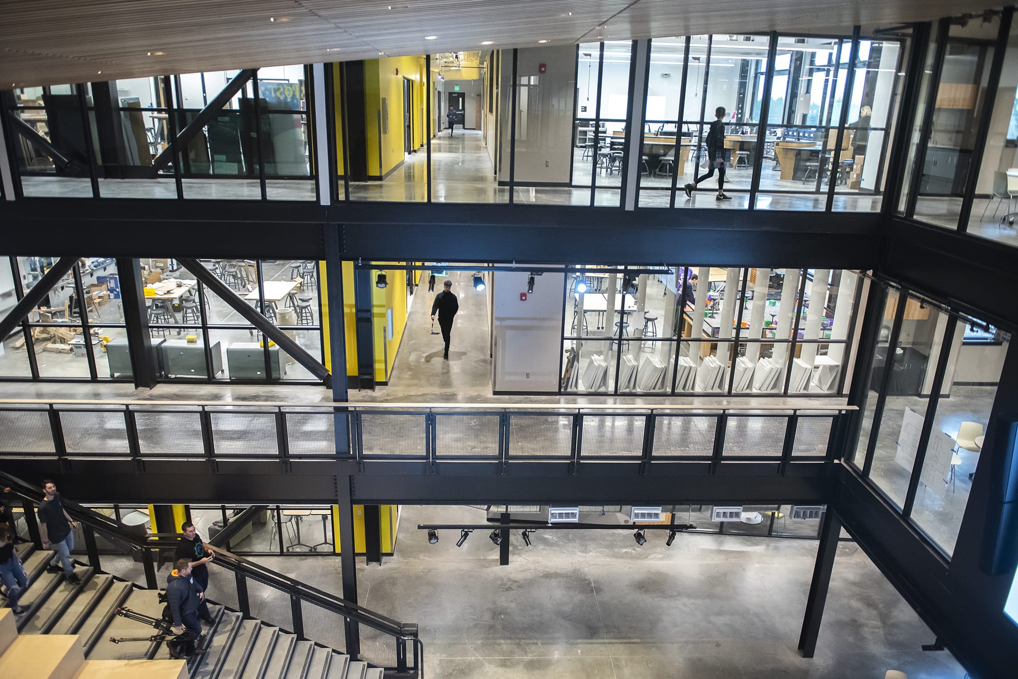 Students walk through the common area of the new 	iTech Preparatory School on Friday morning, Jan. 10, 2020.