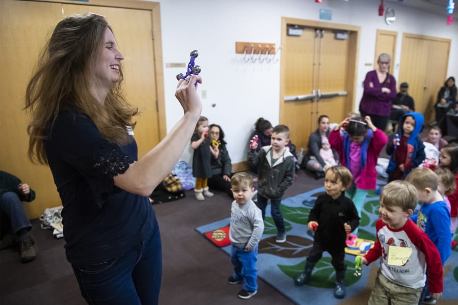 Elizabeth Moss, 37, senior public services librarian at Three Creeks Community Library, leads a preschool storytime in dance. Moss started her journey into librarian work about 10 years ago after working as a theater teacher at a Las Vegas high school.