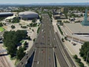 This sketch shows Interstate 5, looking north toward the Moda Center, after auxiliary lanes between onramps and offramps have been added to the freeway and street improvements have been made near the Rose Quarter.