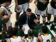 Evergreen boys basketball head coach Brett Henry talks to his players in the final minutes of a game against Prairie at Evergreen High School, Friday, January 24, 2020. Evergreen went on to defeat Prairie 63-57.