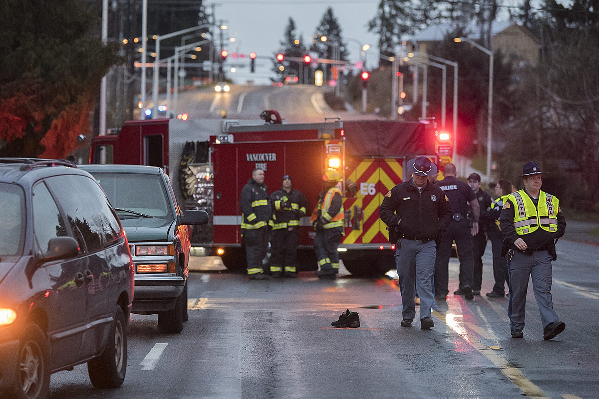 Police investigate the scene after two pedestrians were struck and killed in east Vancouver on Tuesday morning, Jan. 21, 2020.