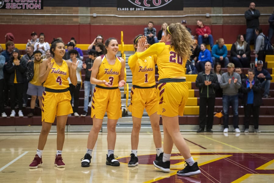 Prairie runs onto the court during introductions before Tuesday night&#039;s game against Kelso at Prairie High School in Vancouver on Jan. 28, 2020.