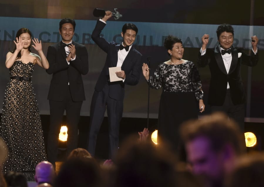 Park So-dam, from left, Lee Sun Gyun, Choi Woo-shik, Lee Jeong-eun and Kang-Ho Song accept the award for outstanding performance by a cast in a motion picture for &quot;Parasite&quot; at the 26th annual Screen Actors Guild Awards at the Shrine Auditorium &amp; Expo Hall on Sunday, Jan. 19, 2020, in Los Angeles.