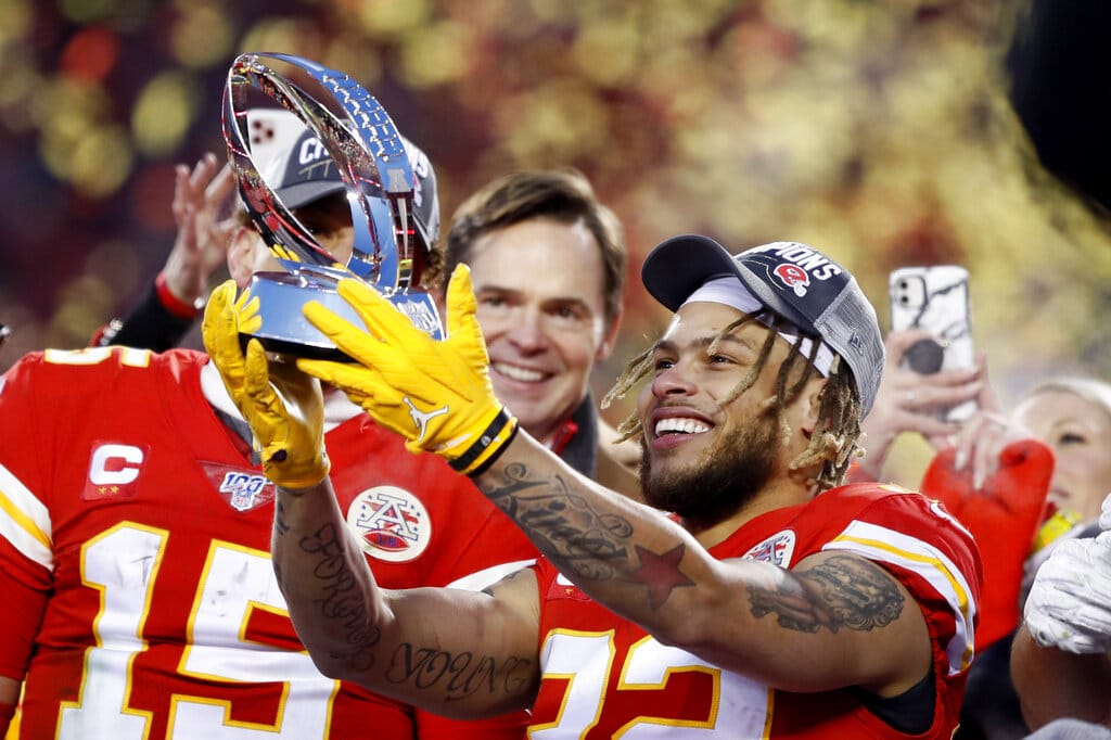 Kansas City Chiefs' Tyrann Mathieu holds up the Lamar Hunt Trophy after the NFL AFC Championship football game against the Tennessee Titans Sunday, Jan. 19, 2020, in Kansas City, MO. The Chiefs won 35-24 to advance to Super Bowl 54.