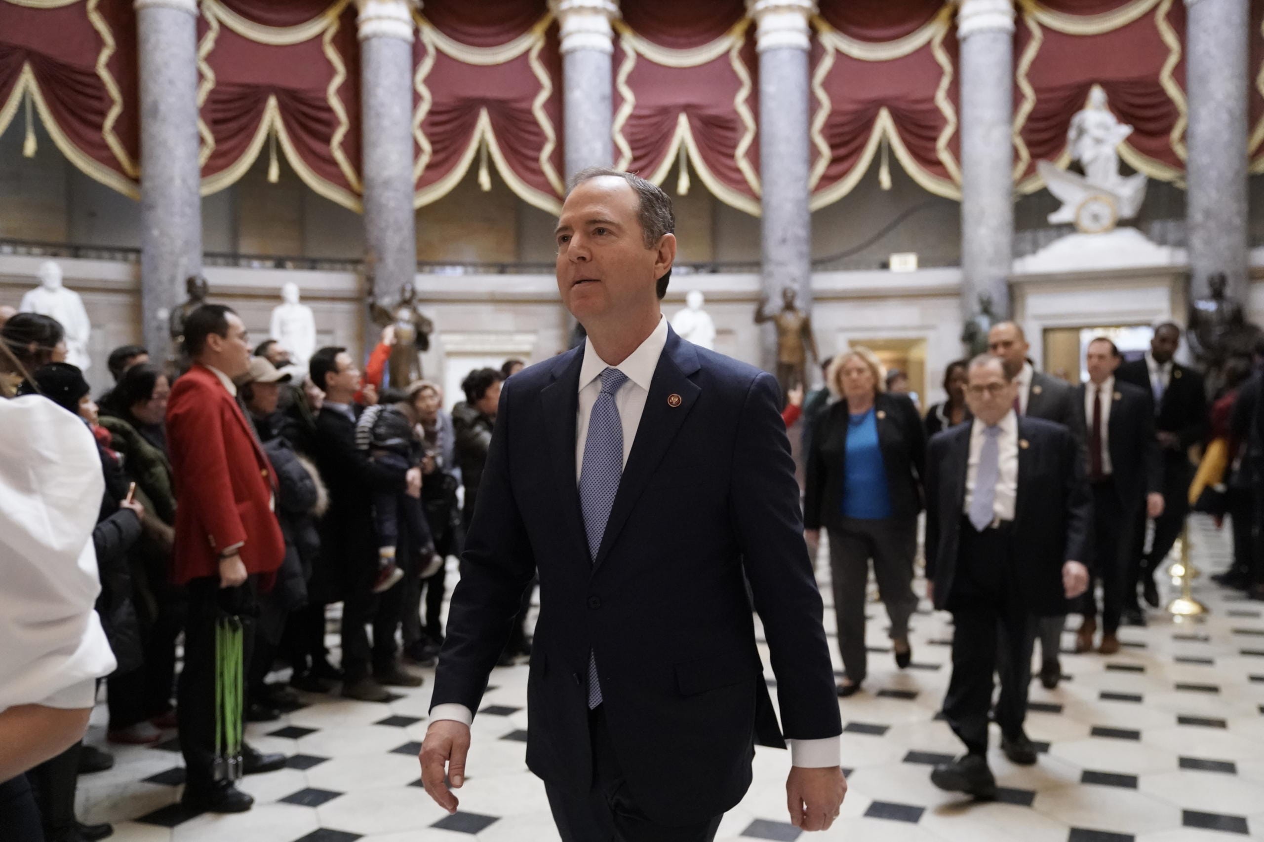 Impeachment managers, House Intelligence Committee Chairman Adam Schiff, D-Calif., front center, followed by House Judiciary Committee Chairman, Rep. Jerrold Nadler, D-N.Y., right, and others, walk to a press conference at the Capitol in Washington, Tuesday, Jan. 21, 2020. Others are Rep. Hakeem Jeffries, D-N.Y., Rep. Sylvia Garcia, D-Texas, Rep. Val Demings, D-Fla., Rep. Zoe Lofgren, D-Calif., and Rep. Jason Crow, D-Colo. (AP Photo/J.