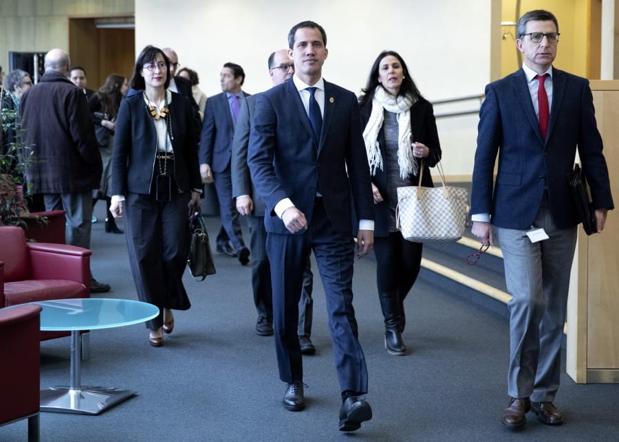Leader of Venezuela&#039;s political opposition Juan Guaido, center, arrives prior to a meeting with European Union foreign policy chief Josep Borrell at EU headquarters on Wednesday, Jan. 22, 2020.