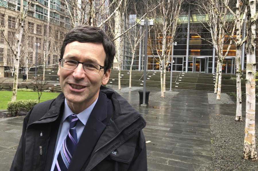 Washington Attorney General Bob Ferguson leaves the U.S. District Court in Seattle Thursday, Jan. 23, 2020, following arguments in his lawsuit challenging the Trump administration&#039;s funding of the wall on the U.S.-Mexico border. The administration is diverting $3.6 billion in military construction money, including $89 million for a naval pier in Washington, toward the wall.