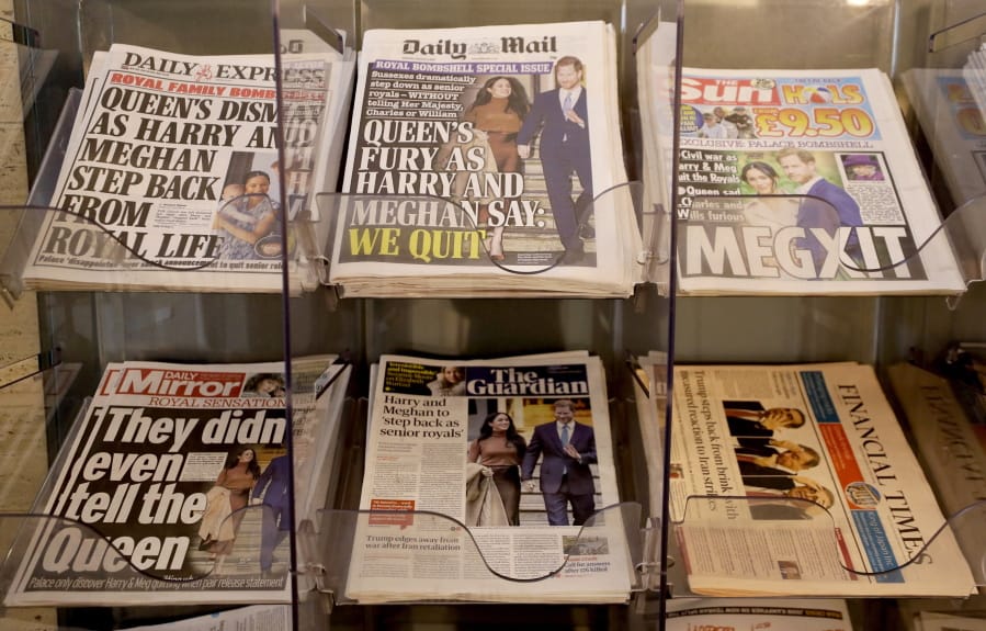 Newspapers are seen for sale in London, Thursday, Jan. 9, 2020.