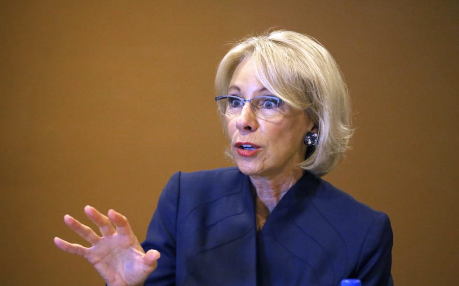 U.S. Education Secretary Betsy DeVos speaks at a roundtable discussion on school choice with Arizona community leaders, educators, parents and students Thursday, Dec. 5, 2019, in Scottsdale, Ariz. DeVos talked about her $5 billion plan to fund tuition for private and charter school students, prior to addressing the American Legislative Exchange Council. (AP Photo/Ross D.