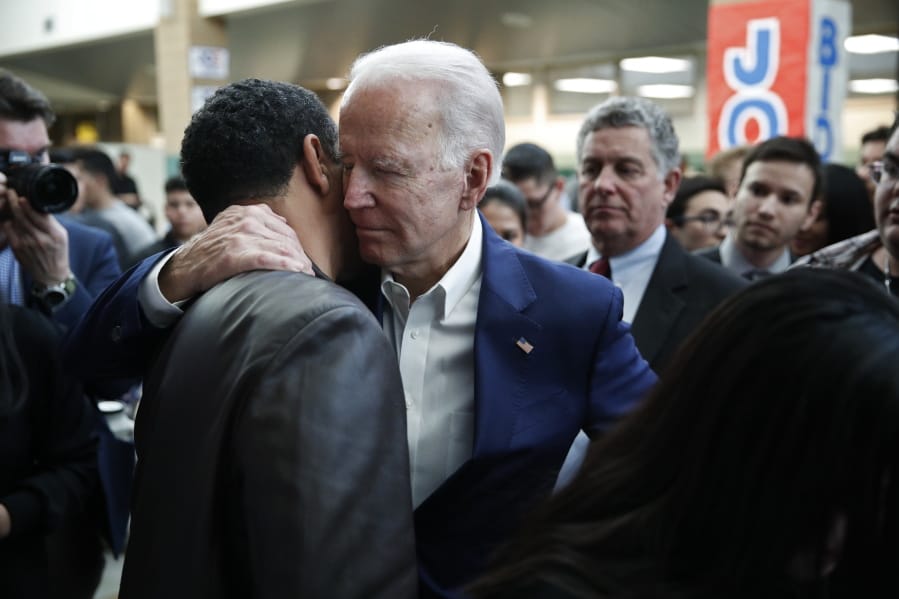 Former Vice President and Democratic presidential candidate Joe Biden embraces a supporter at a campaign event Saturday, Jan. 11, 2020, in Las Vegas.