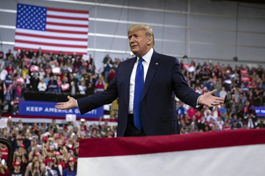 In this Jan. 14, 2020, photo, President Donald Trump arrives at UW-Milwaukee Panther Arena to speak at a campaign rally in Milwaukee.