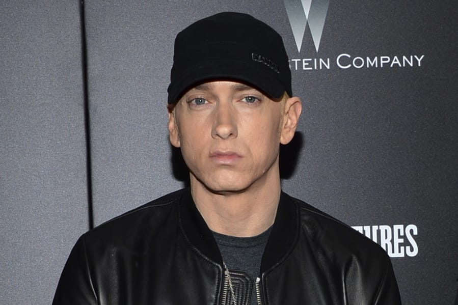 FILE - In this July 20, 2015, file photo, rapper Eminem attends the premiere of &quot;Southpaw&quot; in New York. Rapper Eminem once again dropped a surprise album, releasing &quot;Music to be Murdered By&quot; on Friday, Jan. 17, 2020.