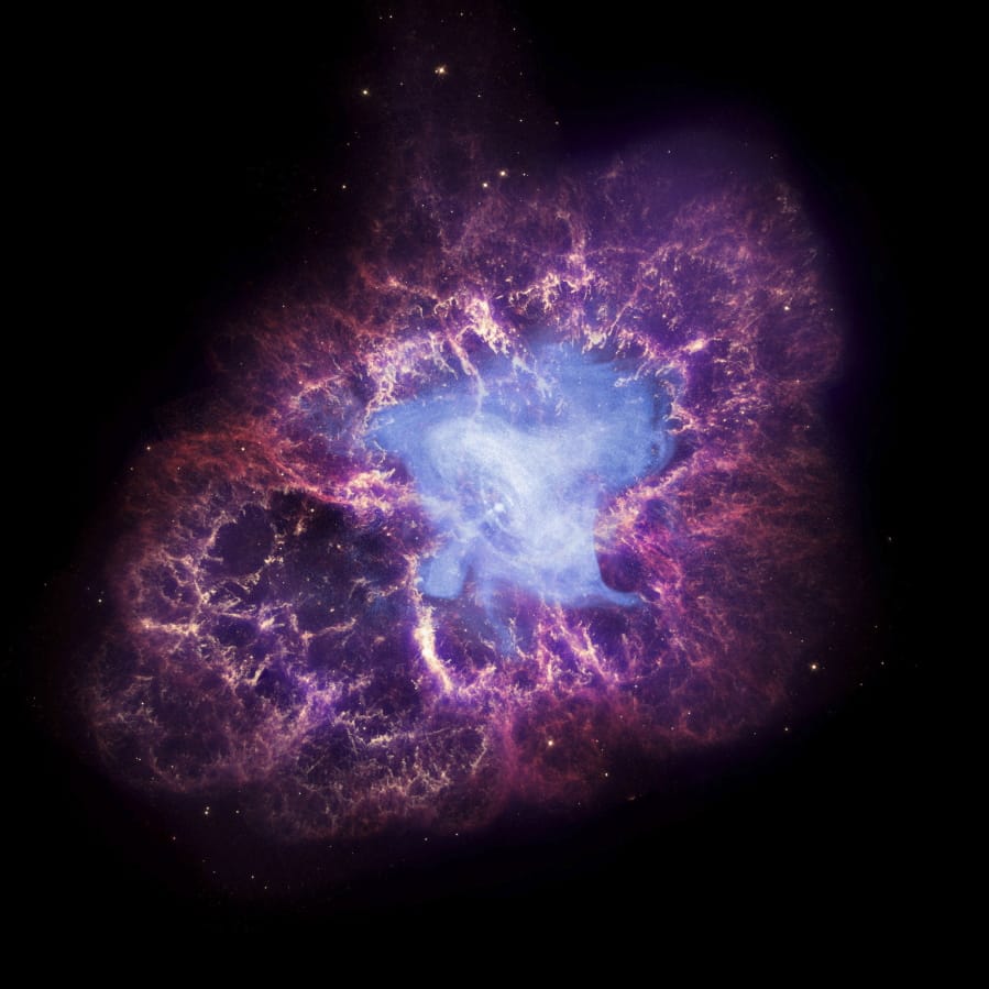 This composite image made available by NASA shows a neutron star, center, left behind by the explosion from the original star&#039;s death in the constellation Taurus, observed on Earth as the supernova of A.D. 1054. (X-Ray: NASA/CXC/J.Hester (ASU); Optical: NASA/ESA/J.Hester &amp; A.Loll (ASU); Infrared: NASA/JPL-Caltech/R.Gehrz (Univ.