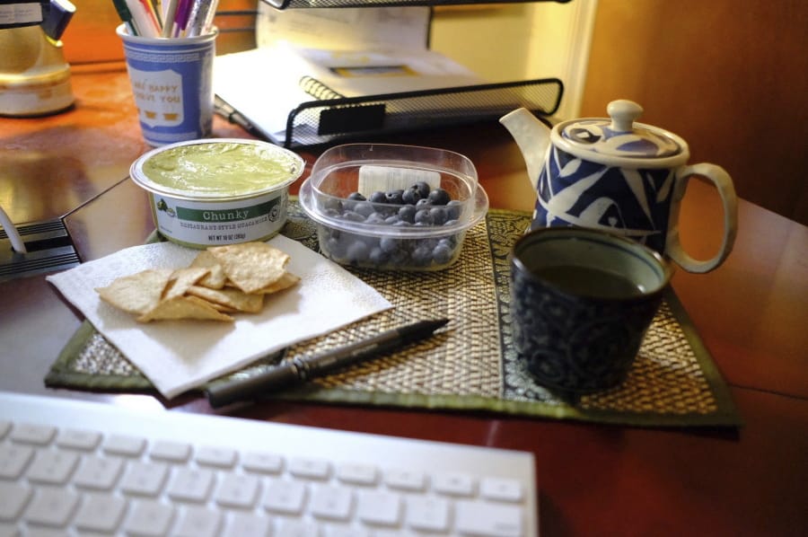 A display of guacamole and chips and blueberries in Allison Park, Pa. To eat healthier, try making small and measurable changes, like bringing a healthy and  appealing snack to work. Expert advice says aim for consistency, not perfection in your diet.