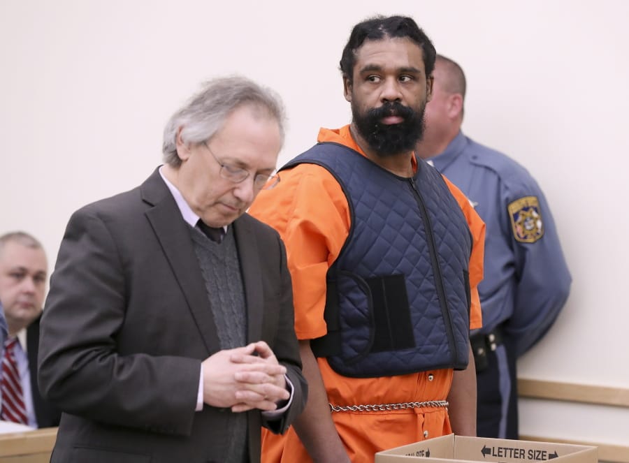 Grafton Thomas, right, with his attorney Michael Sussman, appears at his arraignment in Rockland County Court, Thursday, Jan. 16, 2020, in New City, N.Y. Thomas pleaded not guilty to attempted murder and other charges from an attack at a suburban New York Hanukkah celebration that left five people wounded.