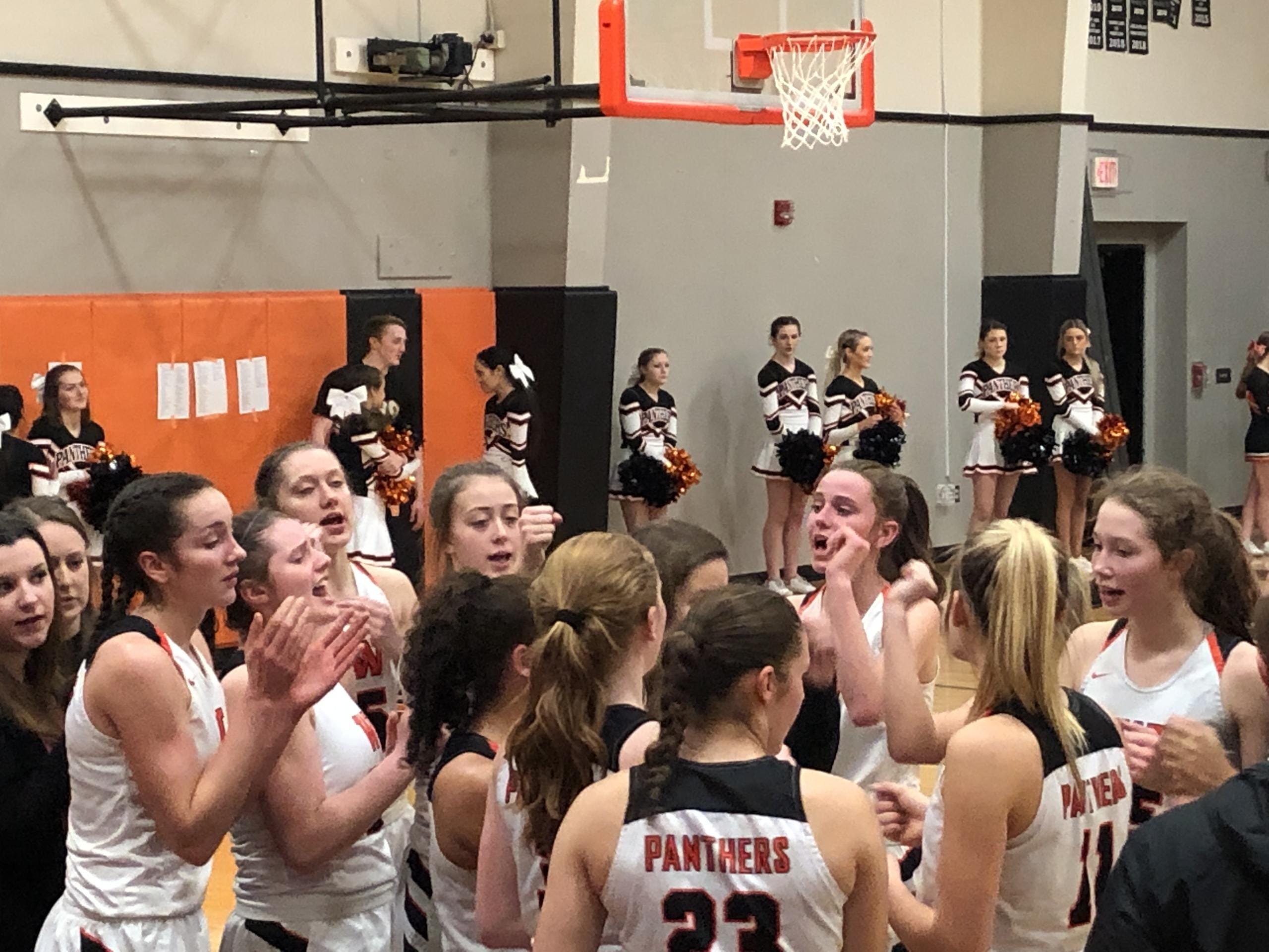 The Washougal girls basketball team breaks a huddle during its 45-40 win over Columbia River on Friday at Washougal High (Micah Rice/The Columbian)
