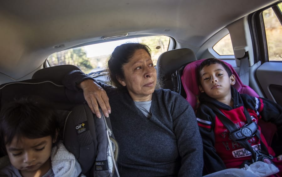 Maria Campos, 52, fights back tears while approaching the Stewart Detention Center with her grandkids to visit her son, Sunday, Nov. 10, 2019, in Lumpkin, Ga. Campos&#039; son was deported a year ago from the same ICE facility where another son is now detained. &quot;My first son, my heart is broken because he&#039;s not here. I don&#039;t want the same for the second one,&quot; said Campos. &quot;This place is a horrible place because not all the lawyers want to go there and fight for our family members.&quot; Immigrants being held in the rural detention center face a host of challenges in fighting their cases. The town has few available resources, only three immigration lawyers work there full time. In the vacuum, a small network has sprung up to help the immigrants.