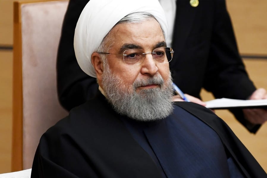 FILE - In this Dec. 20, 2019, file photo, Iranian President Hassan Rouhani attends a meeting with Japanese Prime Minister Shinzo Abe during a meeting at the prime minister&#039;s office in Tokyo.  Iran on Saturday, Jan. 11, 2020, acknowledged that its armed forces &quot;unintentionally&quot; shot down the Ukrainian jetliner that crashed earlier this week, killing all 176 aboard, after the government had repeatedly denied Western accusations that it was responsible.