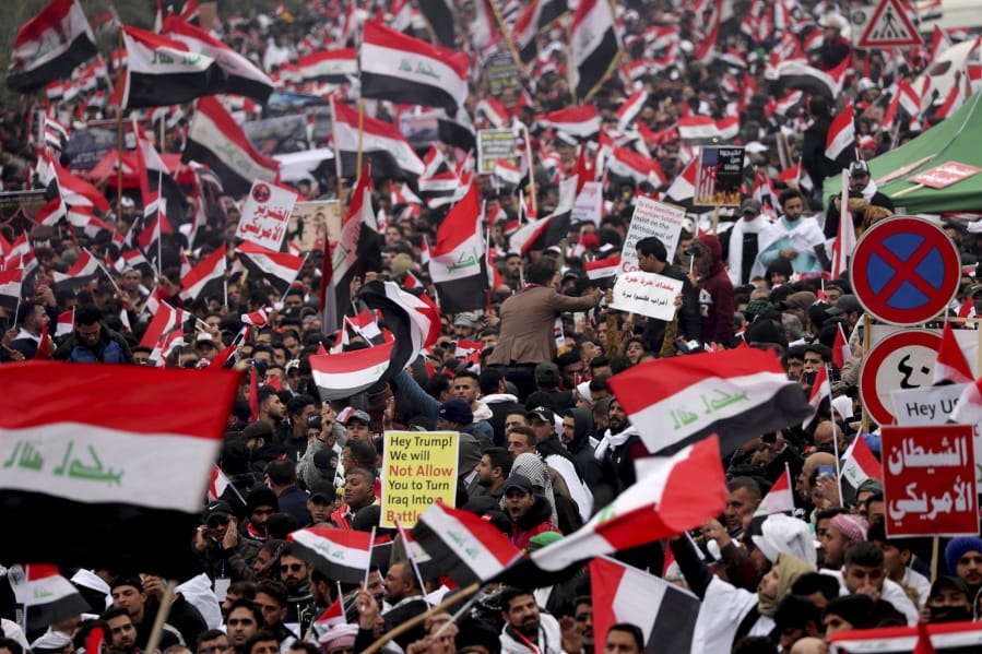 Followers of Shiite cleric Muqtada al-Sadr gather in Baghdad, Iraq, Friday, Jan. 24, 2020. Thousands of supporters of an influential, radical Shiite cleric gathered Friday in central Baghdad for a rally to demand that American troops leave the country amid heightened anti-US sentiment after a drone strike ordered by Washington earlier this month killed a top Iranian general in the Iraqi capital.