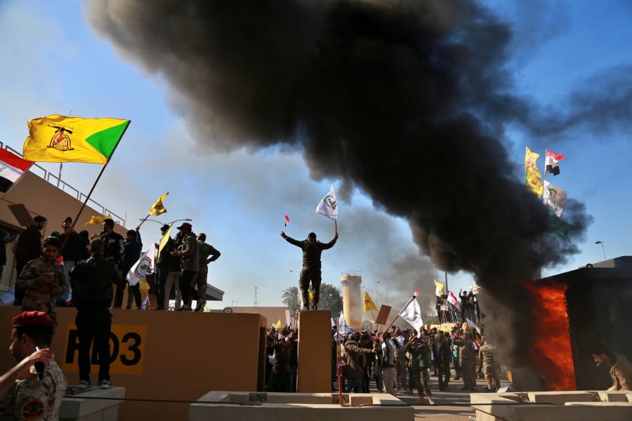 Protesters burn property in front of the U.S. embassy compound in Baghdad, Iraq, on Dec. 31. The U.S. killing of an Iranian general and Iraqi militia commander outside Baghdad on Jan. 3 is stoking anti-Americanism that Iran hopes it can exploit.