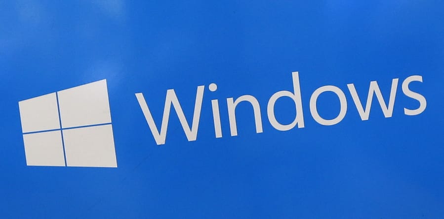 FILE - This Aug. 7, 2017, file shows a Microsoft Widows sign on display at a store in Hialeah, Fla. The National Security Agency has discovered a major security flaw in Microsoft&#039;s Windows operating system. Microsoft says the NSA notified the company about it. A fix was made available Tuesday, Jan. 14, 2020.