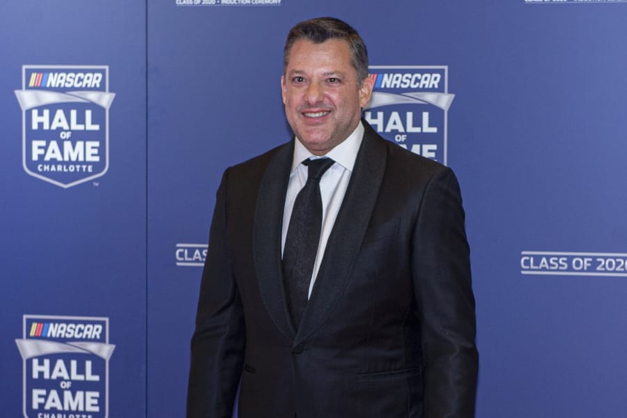 NASCAR Hall of Fame inductee Tony Stewart poses for pictures prior to the induction ceremony in Charlotte, N.C., Friday, Jan. 31, 2020.